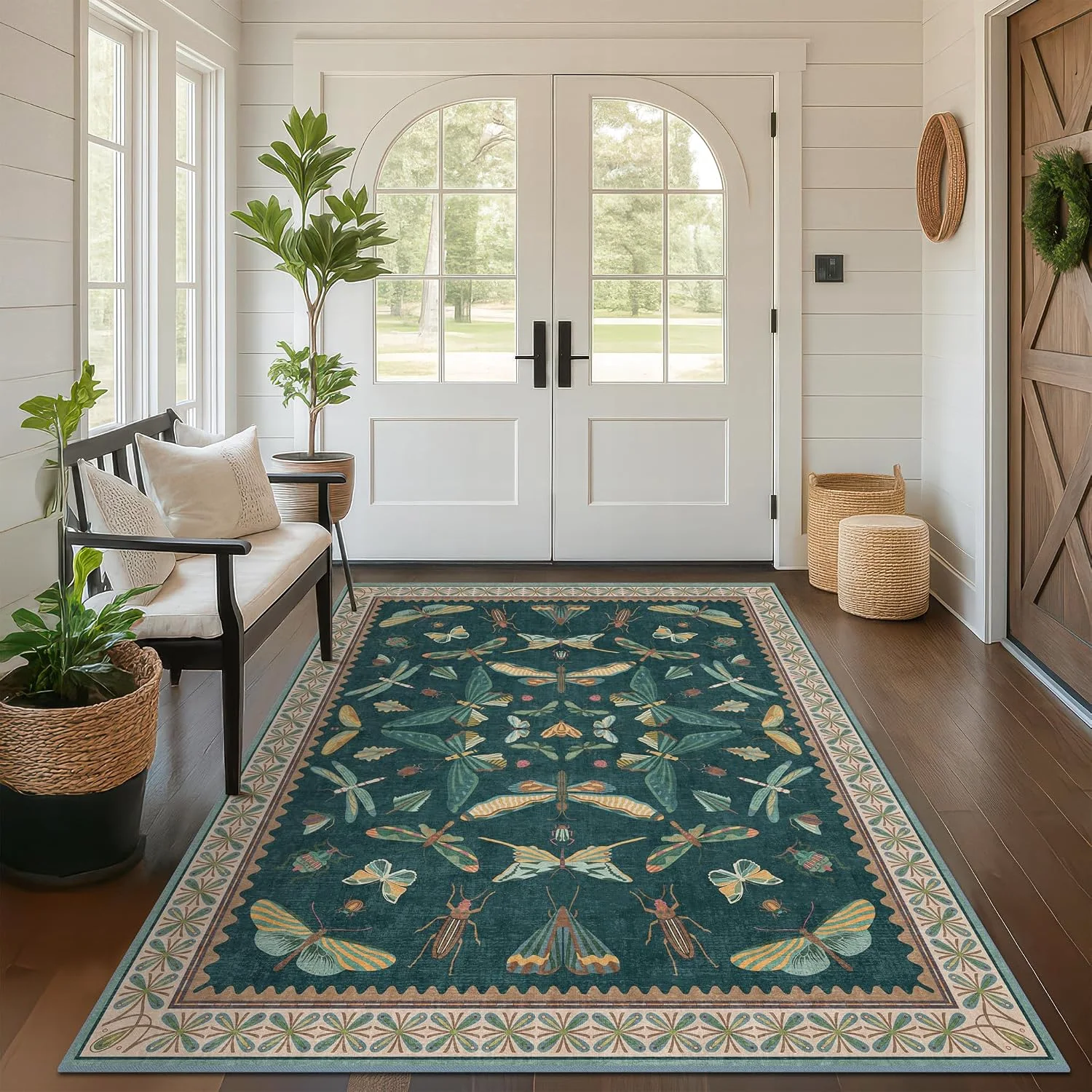A HazoHaus butterfly design at a bright entry, sized so the door sweeps clear over it